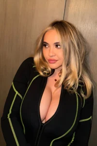 Stella Hudgens on Big Boobs and Phone Booth Topless
